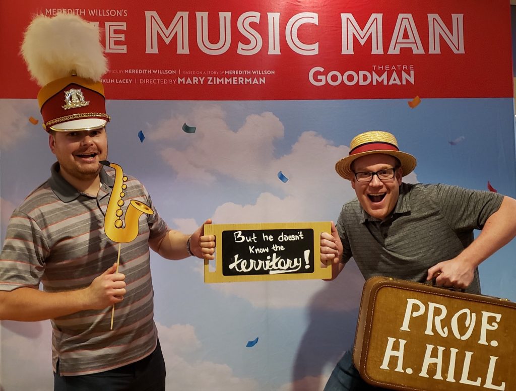 Tim and Patryk at a Music Man photo booth at the Goodman Theatre